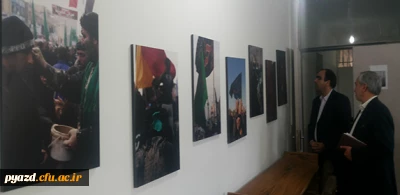 گزارش تصویری از برگزاری نمایشگاه عکس عاشورایی از آثار استاد سلمان زاده در کتابخانه پردیس